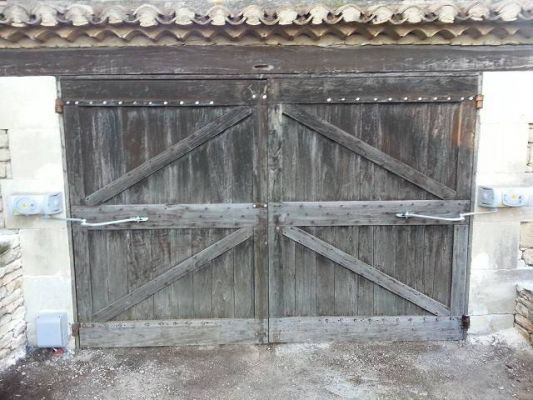 automatisme à bras articulés CAME pour portail battant en fer forgé